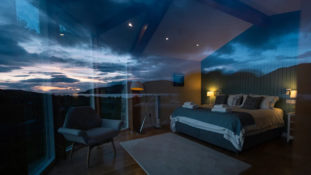 Treetop Hoiuse with window reflections 1