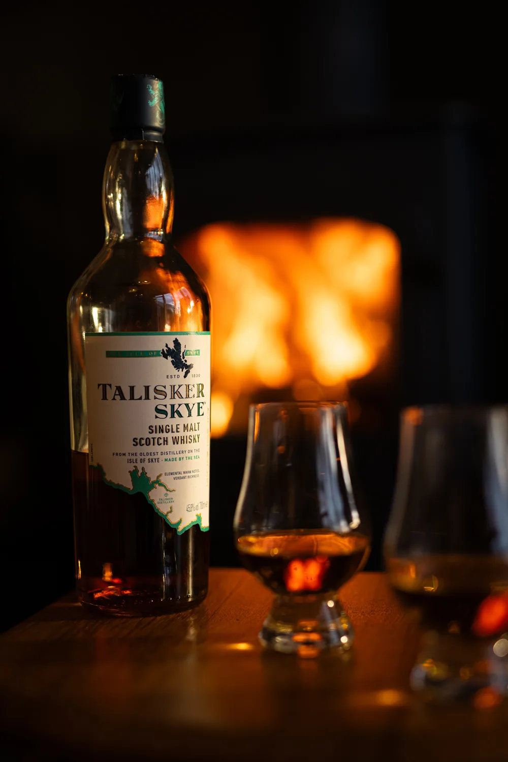 Whiskey by the logburner in The Stonehouses