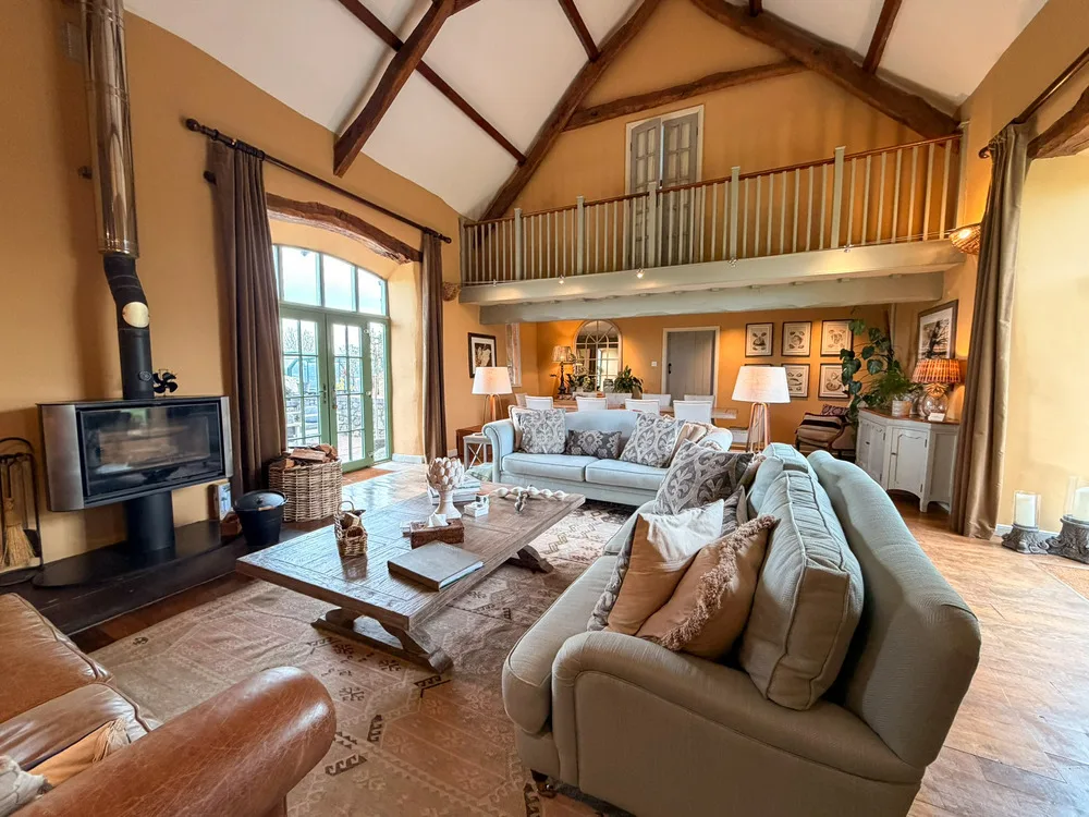 ysgubor-degwm-spacious-vaulted-lounge-wood-burning-stove